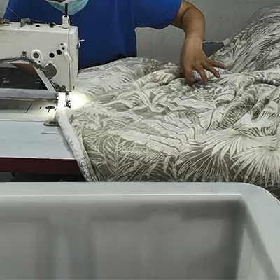 Stitch along the lines to secure the layers in place